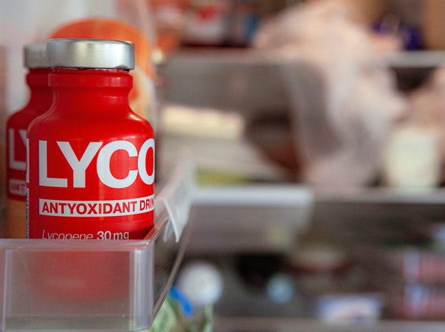 Bottle of Lyco antioxidant drink on a kitchen counter