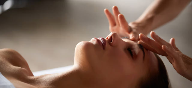 Woman receiving a facial massage